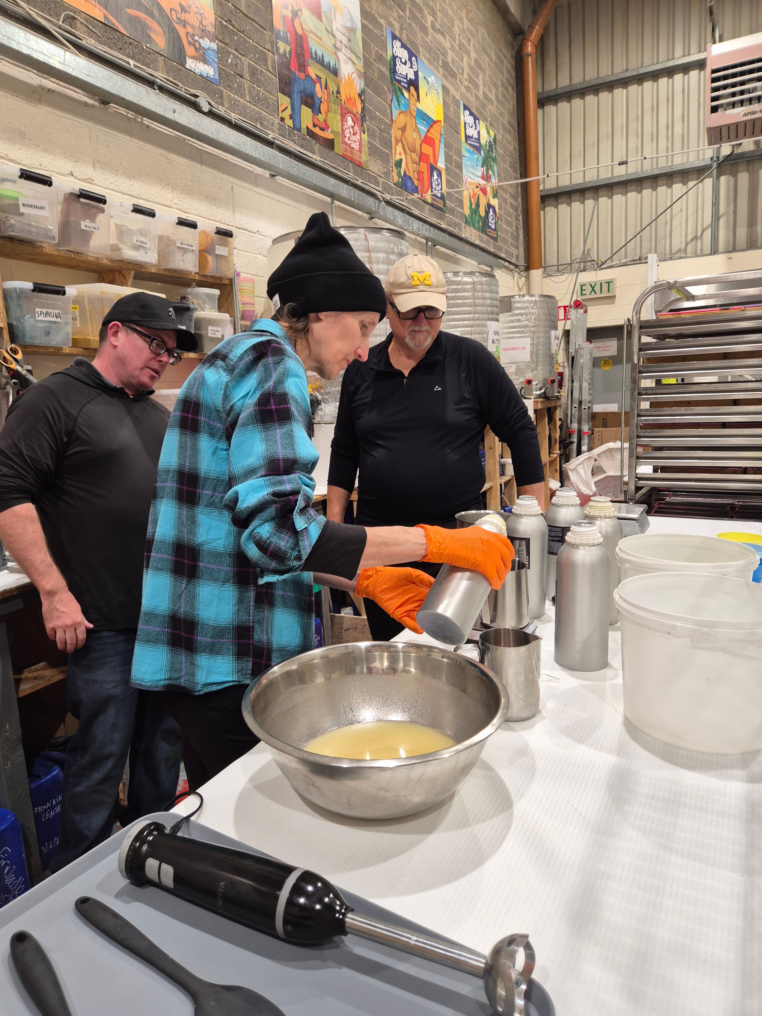 Last year's winner adding fragrance to their custom soap at The Black Stuff workshop