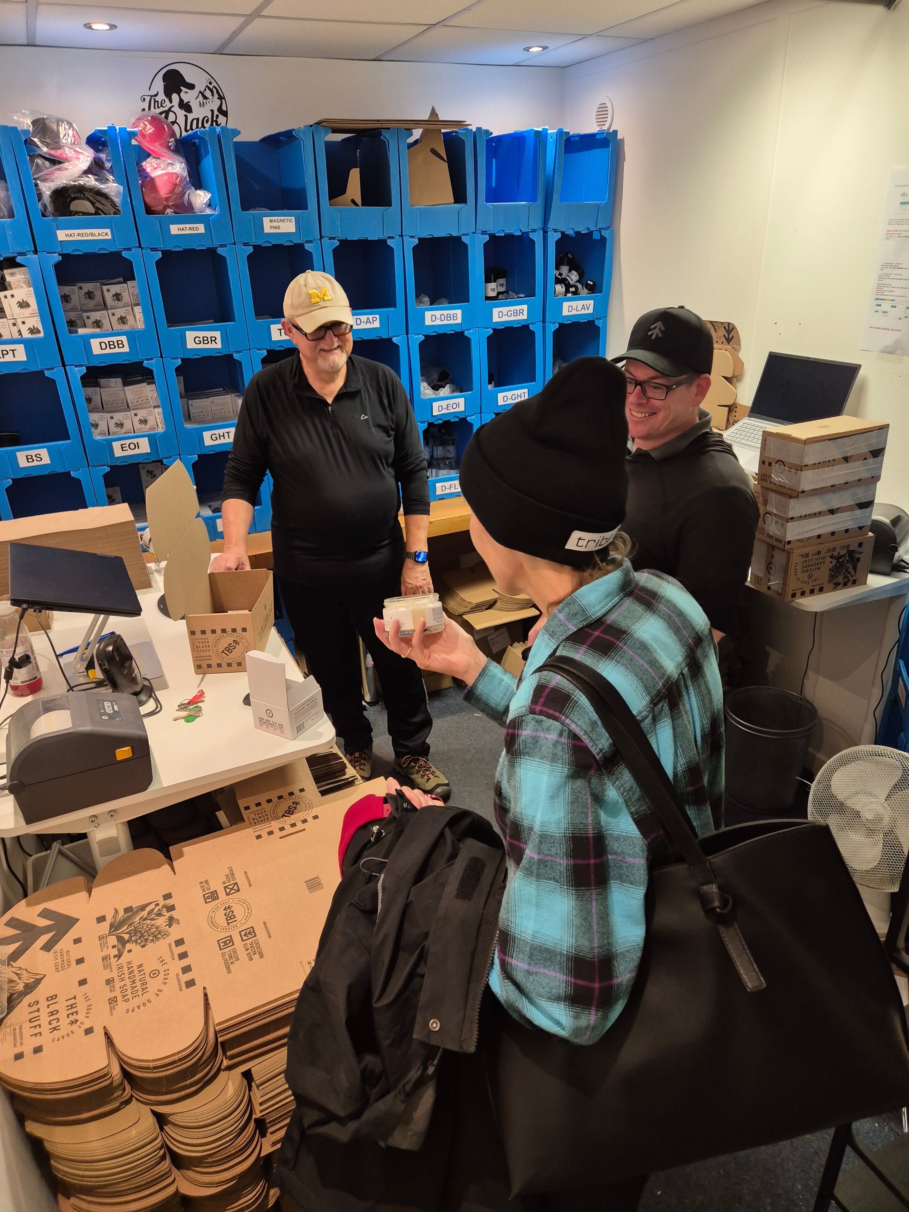 Last year's winner meeting The Black Stuff team in the warehouse